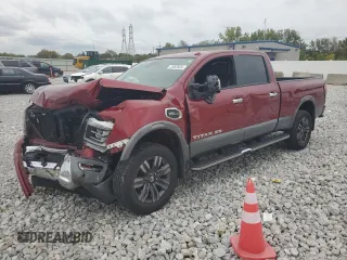 2020 Nissan Titan XD Platinum Reserve with VIN 1N6AA1FB1LN507719, listed as a Copart auction lot 73287624 with 52,892 mi miles and Salvage Title. Bid and sale history available at carsss.com. Image 1.