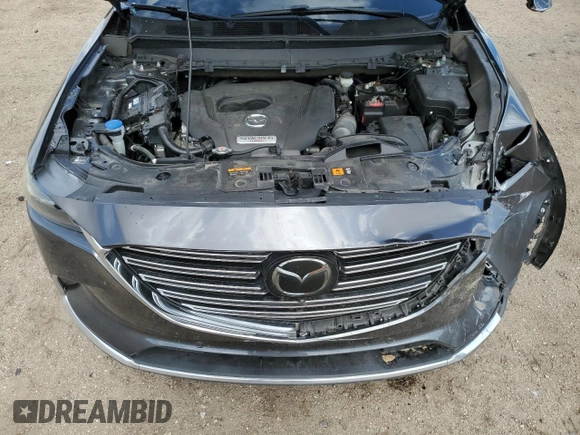 2021 Mazda CX-9 Grand Touring with VIN JM3TCBDY7M0536781, listed as a Copart auction lot 55862725 with 62,131 mi miles and Salvage title. Bid and sale history available at DreamBid. Image 12.