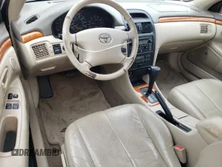 2002 Toyota Solara SE with VIN 2T1CF28P42C601042, listed as a Copart auction lot 74818624 with 70,551 mi miles and Salvage Title. Bid and sale history available at DreamBid. Image 8.