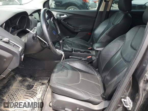 2015 Ford Focus Titanium z VIN 1FADP3N2XFL357224, wystawiony jako Copart lot #55626575 z przebiegiem 159 422 mil mil oraz Szkoda całkowita • Salvage title. Historia ofert i sprzedaży dostępna na DreamBid. Obrazek 7.