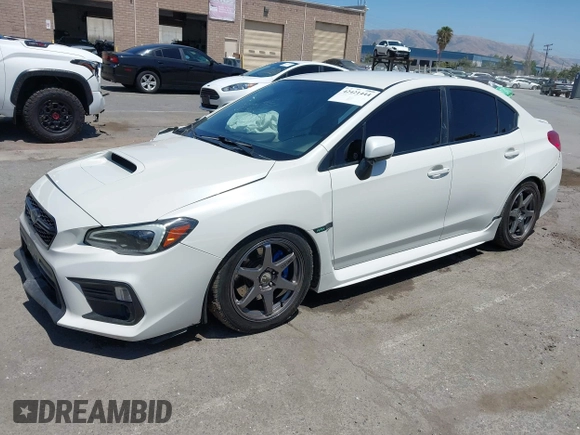 2021 Subaru WRX z VIN JF1VA1A68M9801794, wystawiony jako IAAI lot #42421444 z przebiegiem 100 920 mil mil oraz . Historia ofert i sprzedaży dostępna na DreamBid. Obrazek 17.