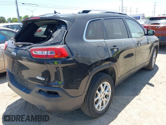 2016 Jeep Cherokee Latitude with VIN 1C4PJLCB6GW257942, listed as a IAAI auction lot 42020649 with 135,808 mi miles and . Bid and sale history available at DreamBid. Image 4.