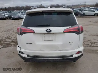 2018 Toyota RAV4 XLE with VIN JTMRFREV6JJ734927, listed as a IAAI auction lot 41510616 with 119,687 mi miles. Bid and sale history available at carsss.com. Image 16.