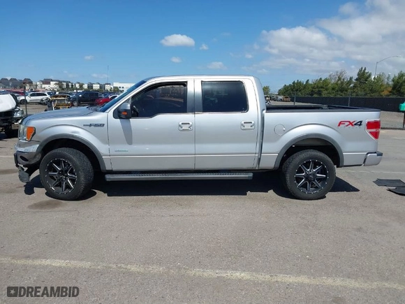 2013 Ford F-150 XL with VIN 1FTFW1ETXDFB30887, listed as a IAAI auction lot 41809584 with 191,496 mi miles. Bid and sale history available at carsss.com. Image 14.