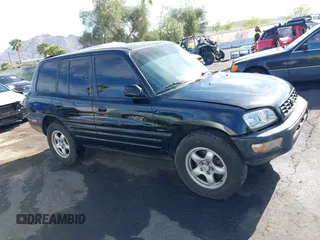 1999 Toyota RAV4 with VIN JT3GP10V9X7058125, listed as a IAAI auction lot 42056633 with 247,015 mi miles and . Bid and sale history available at DreamBid. Image 12.