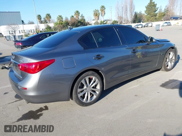 2015 Infiniti Q50 Premium with VIN JN1BV7APXFM333101, listed as a IAAI auction lot 41667109 with 112,477 mi miles and . Bid and sale history available at DreamBid. Image 4.