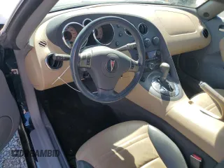 2006 Pontiac Solstice z VIN 1G2MB35B66Y114607, wystawiony jako Copart lot #65229324 z przebiegiem 41 804 mil mil oraz Szkoda całkowita • Salvage title. Historia ofert i sprzedaży dostępna na DreamBid. Obrazek 8.