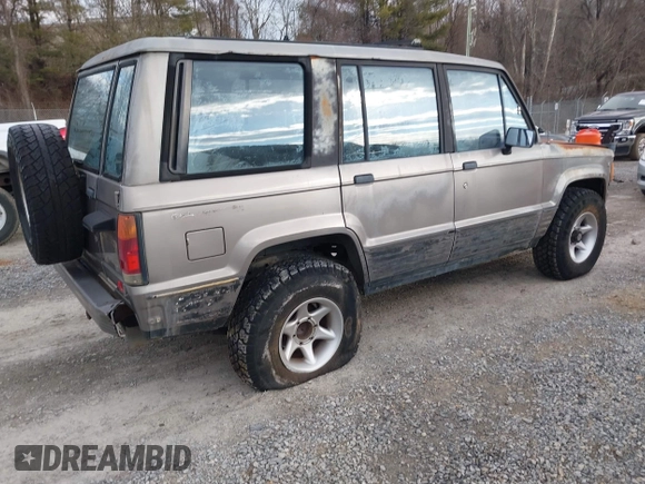 1990 Isuzu Trooper z VIN JACCH58R0L8900522, wystawiony jako IAAI lot #41642808 z przebiegiem 177 690 mil mil oraz . Historia ofert i sprzedaży dostępna na DreamBid. Obrazek 4.