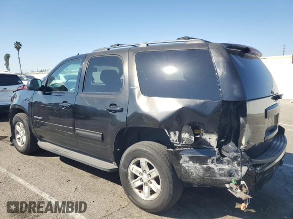 2014 GMC Yukon SLT with VIN 1GKS1CE07ER208318, listed as a Copart auction lot 46097405 with 98,882 mi miles and Salvage Title. Bid and sale history available at carsss.com. Image 2.