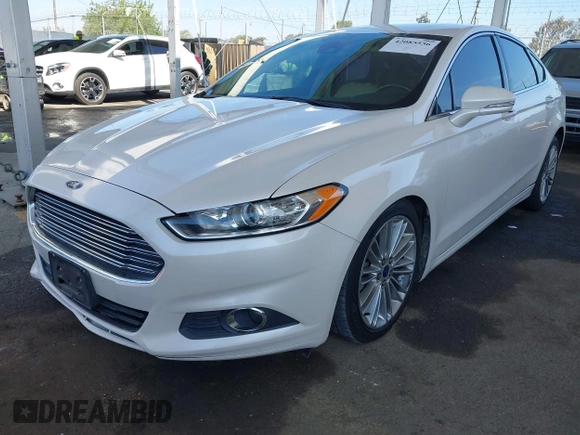 2013 Ford Fusion SE Hybrid z VIN 3FA6P0LU1DR310075, wystawiony jako IAAI lot #42085556 z przebiegiem Nie podano mil oraz . Historia ofert i sprzedaży dostępna na DreamBid. Obrazek 2.