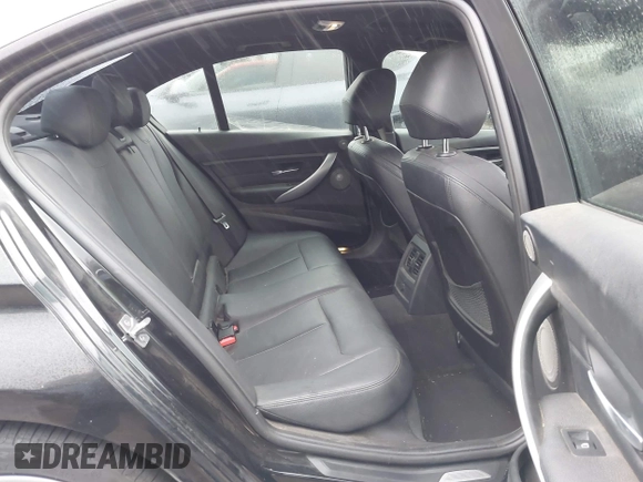 2014 BMW 3 Series 335i with VIN WBA3A9C57EF477662, listed as a IAAI auction lot 41435544 with 129,543 mi miles. Bid and sale history available at carsss.com. Image 8.