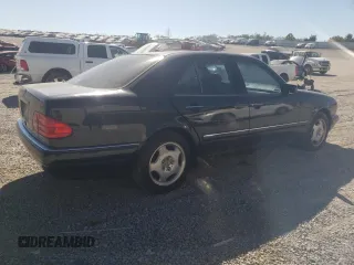 1997 Mercedes-Benz E-Class with VIN WDBJF72F0VA189407, listed as a Copart auction lot 76073234 with 114,692 mi miles and Salvage Title. Bid and sale history available at carsss.com. Image 3.