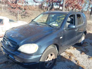 2000 Mercedes-Benz M-Class with VIN 4JGAB54E0YA146627, listed as a IAAI auction lot 41292173 with 116,790 mi miles. Bid and sale history available at carsss.com. Image 2.
