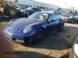 2021 Porsche 911 Carrera with VIN WP0AA2A99MS205658, listed as a Copart auction lot 81368694 with 32,347 mi miles and Salvage Title. Bid and sale history available at carsss.com. Image 1.