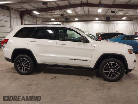 2017 Jeep Grand Cherokee Trailhawk with VIN 1C4RJFLG7HC712208, listed as a IAAI auction lot 42174543 with 158,518 mi miles and . Bid and sale history available at DreamBid. Image 13.