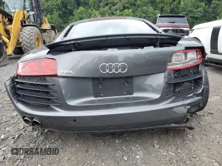 2010 Audi R8 z VIN WUAAUAFGXAN001411, wystawiony jako Copart lot #66520774 z przebiegiem 21 691 mil mil oraz Szkoda całkowita • Salvage title. Historia ofert i sprzedaży dostępna na DreamBid. Obrazek 6.