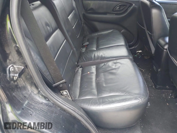 2004 Ford Escape Limited with VIN 1FMCU94124KA36321, listed as a IAAI auction lot 41565490 with 203,933 mi miles. Bid and sale history available at carsss.com. Image 8.
