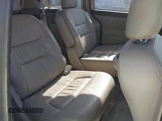 2003 Honda Odyssey EX-L z VIN 5FNRL18993B017733, wystawiony jako IAAI lot #42293386 z przebiegiem 86 659 mil mil oraz . Historia ofert i sprzedaży dostępna na DreamBid. Obrazek 8.
