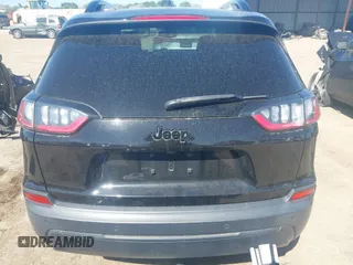 2021 Jeep Cherokee Altitude with VIN 1C4PJLLBXMD112667, listed as a IAAI auction lot 41959004 with 25,524 mi miles and . Bid and sale history available at DreamBid. Image 17.