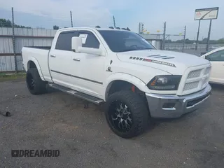 2014 Ram 2500 Laramie z VIN 3C6UR5FL8EG158067, wystawiony jako IAAI lot #42464438 z przebiegiem 161 385 mil mil oraz . Historia ofert i sprzedaży dostępna na DreamBid. Obrazek 1.