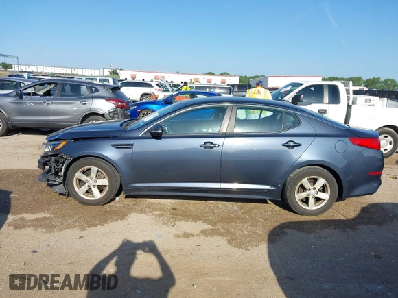 2015 Kia Optima LX with VIN KNAGM4A71F5568868, listed as a IAAI auction lot 42431920 with 138,217 mi miles and . Bid and sale history available at DreamBid. Image 14.