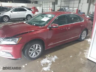 2017 Volkswagen Passat 1.8T S with VIN 1VWAT7A33HC039279, listed as a IAAI auction lot 40902796 with 143,730 mi miles. Bid and sale history available at carsss.com. Image 14.
