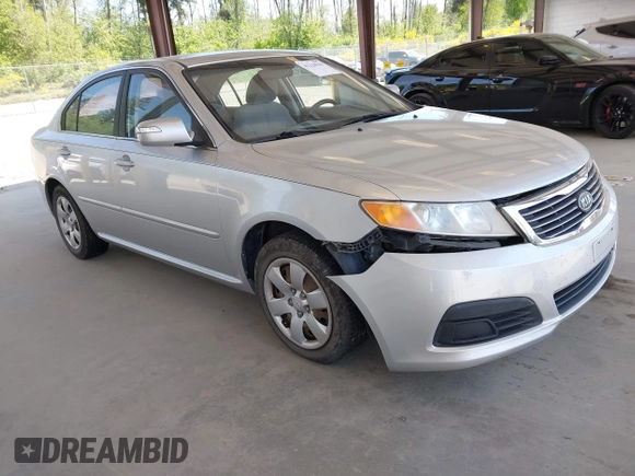 2009 Kia Optima LX z VIN KNAGE228795357008, wystawiony jako IAAI lot #42228948 z przebiegiem 148 194 mil mil oraz . Historia ofert i sprzedaży dostępna na DreamBid. Obrazek 1.