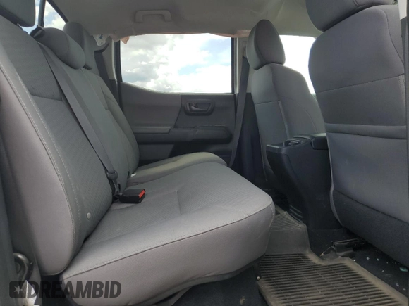 2021 Toyota Tacoma SR z VIN 3TMCZ5ANXMM375679, wystawiony jako Copart lot #58207995 z przebiegiem Nie podano mil oraz Szkoda całkowita • Salvage title. Historia ofert i sprzedaży dostępna na DreamBid. Obrazek 10.