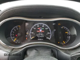 2014 Jeep Grand Cherokee Summit with VIN 1C4RJFJG1EC323658, listed as a Copart auction lot 50740115 with 253,656 mi miles and Salvage title. Bid and sale history available at DreamBid. Image 9.