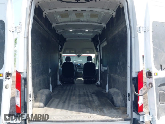 2023 Ford Transit Cargo с VIN 1FTBR1X88PKB01513, выставлен на аукционе IAAI как лот 42496329 с пробегом 65 621 миль миль и . История ставок и продаж доступна на DreamBid. Изображение 18.