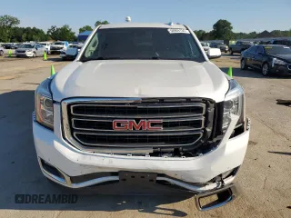 2016 GMC Yukon SLT with VIN 1GKS2BKCXGR259482, listed as a Copart auction lot 58969134 with 119,862 mi miles and Salvage Title. Bid and sale history available at carsss.com. Image 5.