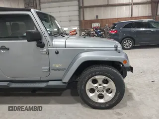 2014 Jeep Wrangler Unlimited Sahara with VIN 1C4BJWEG5EL164350, listed as a IAAI auction lot 42018586 with 113,222 mi miles. Bid and sale history available at carsss.com. Image 19.