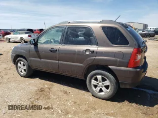 2009 Kia Sportage LX with VIN KNDJF724697568334, listed as a Copart auction lot 54056605 with 252,049 mi miles and Clean Title. Bid and sale history available at carsss.com. Image 2.