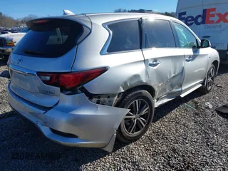 2019 Infiniti QX60 LUXE with VIN 5N1DL0MN3KC555343, listed as a IAAI auction lot 41331200 with 103,085 mi miles. Bid and sale history available at carsss.com. Image 4.