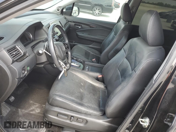 2020 Honda Pilot Touring 8-Passenger with VIN 5FNYF5H98LB013778, listed as a Copart auction lot 53112115 with 86,276 mi miles and Salvage Title. Bid and sale history available at DreamBid. Image 7.