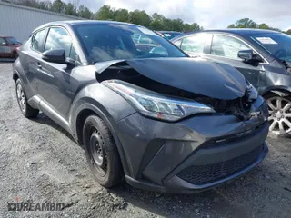 2021 Toyota C-HR LE with VIN NMTKHMBX9MR128998, listed as a IAAI auction lot 41575235 with 96,908 mi miles. Bid and sale history available at carsss.com. Image 1.