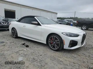 2022 BMW 4 Series M440i with VIN WBA53AT06NCK03623, listed as a Copart auction lot 62363465 with Not provided miles and Salvage title. Bid and sale history available at DreamBid. Image 4.