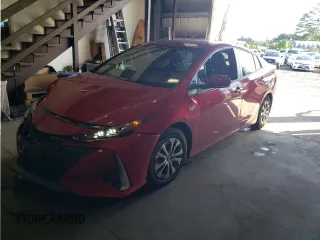 2021 Toyota Prius LE z VIN JTDKAMFP2M3177235, wystawiony jako Copart lot #42419305 z przebiegiem 16 388 mil mil oraz Szkoda całkowita • Salvage title. Historia ofert i sprzedaży dostępna na DreamBid. Obrazek 1.
