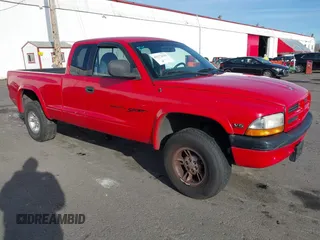1999 Dodge Dakota SLT with VIN 1B7GG22XXXS290116, listed as a IAAI auction lot 41372636 with 132,112 mi miles and . Bid and sale history available at carsss.com. Image 1.