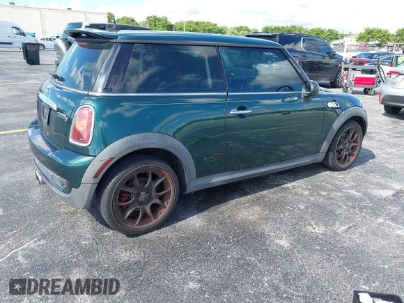 2007 MINI Hardtop S with VIN WMWMF73507TV30183, listed as a IAAI auction lot 42574374 with 90,334 mi miles and . Bid and sale history available at DreamBid. Image 4.