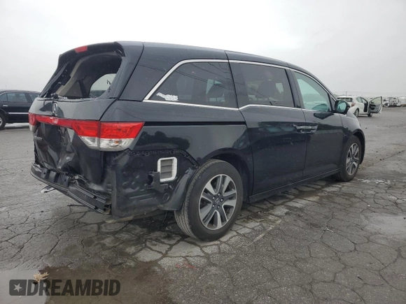 2015 Honda Odyssey Touring Elite z VIN 5FNRL5H93FB092682, wystawiony jako Copart lot #56884835 z przebiegiem 115 810 mil mil oraz Szkoda całkowita • Salvage title. Historia ofert i sprzedaży dostępna na DreamBid. Obrazek 3.