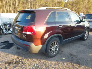 2011 Kia Sorento EX with VIN 5XYKUDA25BG033707, listed as a IAAI auction lot 41406401 with 166,753 mi miles. Bid and sale history available at carsss.com. Image 4.