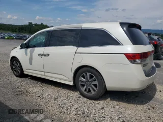 2014 Honda Odyssey Touring with VIN 5FNRL5H94EB080815, listed as a Copart auction lot 65244325 with 153,314 mi miles and Salvage title. Bid and sale history available at DreamBid. Image 2.