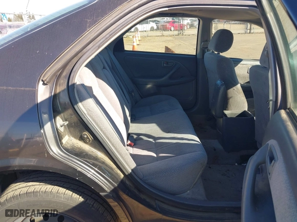 2000 Toyota Camry CE with VIN JT2BG22K7Y0501602, listed as a IAAI auction lot 41841064 with 236,611 mi miles. Bid and sale history available at carsss.com. Image 8.