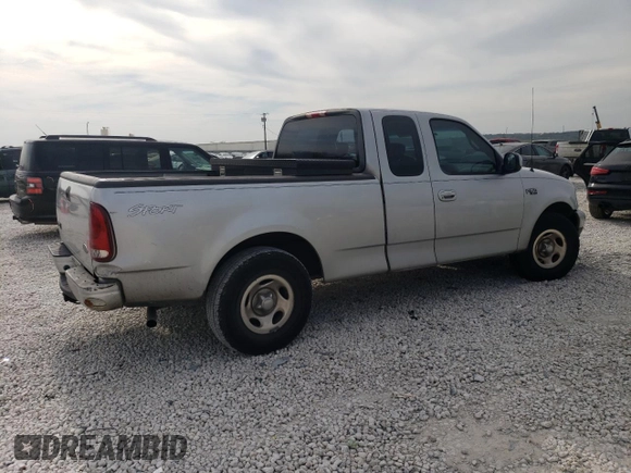 2002 Ford F-150 XL with VIN 1FTRX17282NA63790, listed as a Copart auction lot 42057394 with 158,054 mi miles and Salvage Title. Bid and sale history available at carsss.com. Image 3.