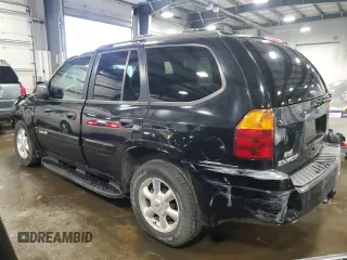 2004 GMC Envoy SLT with VIN 1GKDT13S642191868, listed as a Copart auction lot 82334304 with 150,810 mi miles and Salvage Title. Bid and sale history available at carsss.com. Image 2.