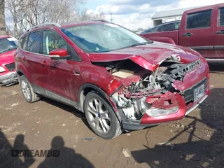 2015 Ford Escape Titanium with VIN 1FMCU9J91FUA97855, listed as a IAAI auction lot 41689650 with 125,487 mi miles. Bid and sale history available at carsss.com. Image 1.