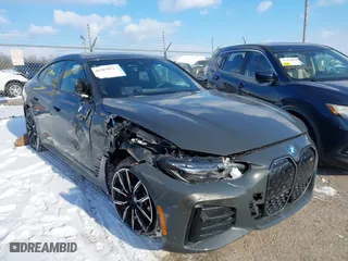 2023 BMW i4 M50 with VIN WBY33AW03PFN81310, listed as a IAAI auction lot 41387873 with 21,586 mi miles. Bid and sale history available at carsss.com. Image 6.