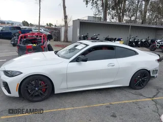 2022 BMW 4 Series 430i with VIN WBA53AP02NCK91287, listed as a IAAI auction lot 41448686 with 27,046 mi miles and . Bid and sale history available at carsss.com. Image 15.