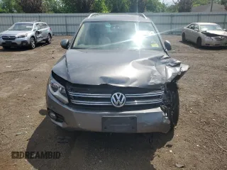 2013 Volkswagen Tiguan SE with VIN WVGBV7AX1DW009495, listed as a Copart auction lot 62289675 with Not provided miles and Salvage title. Bid and sale history available at DreamBid. Image 5.